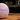 Custom basketball with personalised name and number displayed on an indoor basketball court